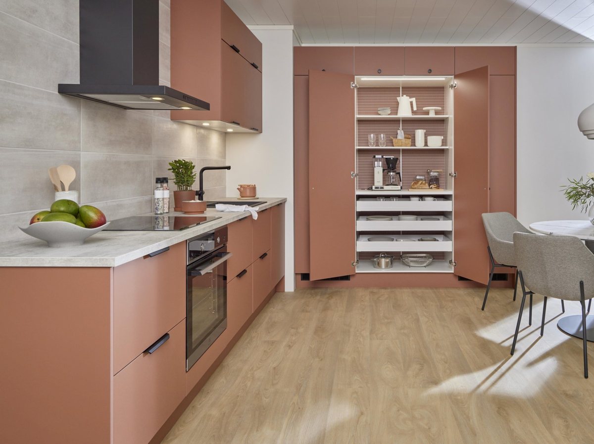 Terracotta ALVIC Cotto cabinetry warmed by daylight in a contemporary interior