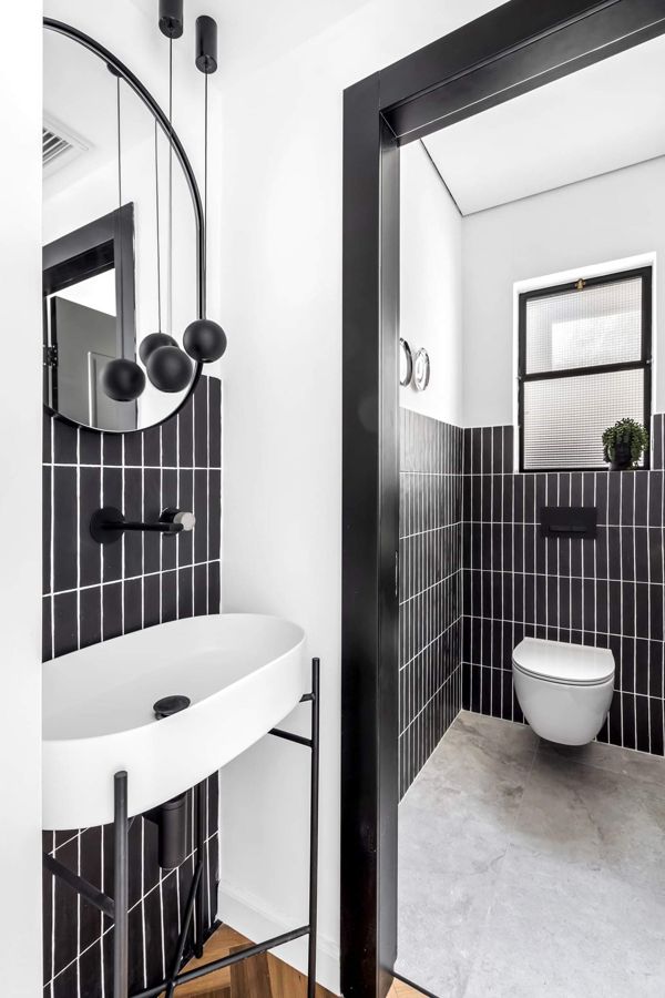 Black and Herringbone Duplex — custom kitchens, built-ins & wall units, wall paneling, bathroom vanities by iKitchen Cabinetry, view 14